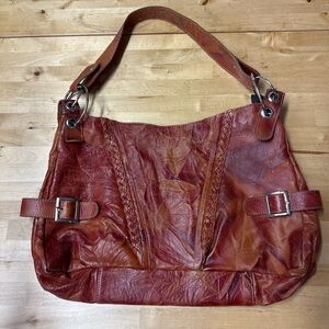 Orangish Brown leather shoulder bag with buckle detailing